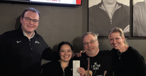 The Big Fat Tip #94 surprise $1000 tip at Barrel Bar Louisville Kentucky March 2026 - service worker receiving random act of kindness from Big Fat Tip nonprofit